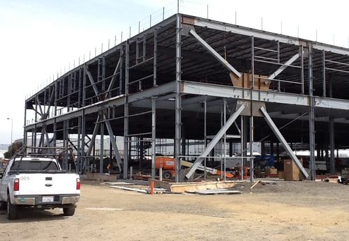 The steel frame of the FedEx Sorting Facility in the middle of construction.
