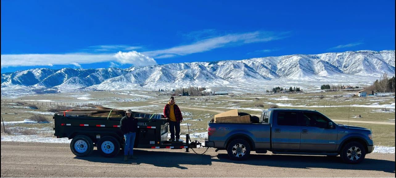 R.A.P. Pick-Up truck and hauling trailer in front of Casper Mountain