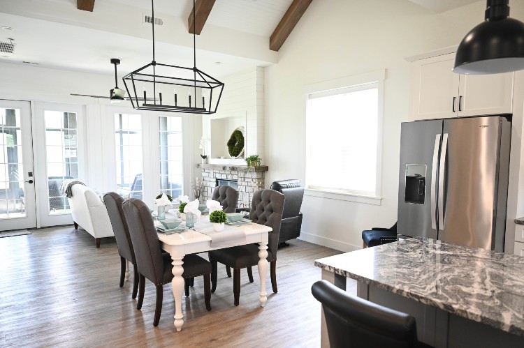 Modern kitchen and dining area with central island in a villa apartment, Central Ohio