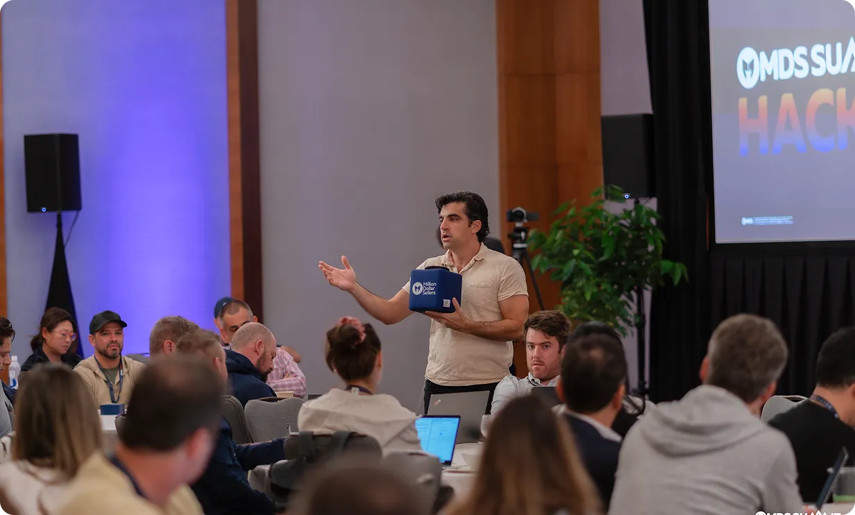Speaker presenting at the MDS Summit Hack Contest
