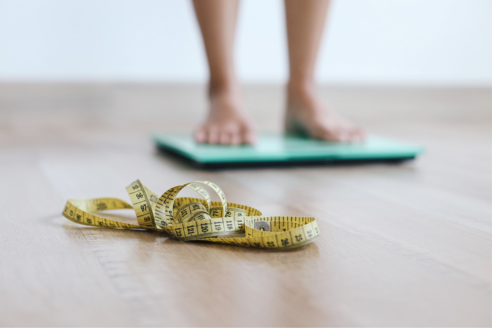 Tape measure, person on scale