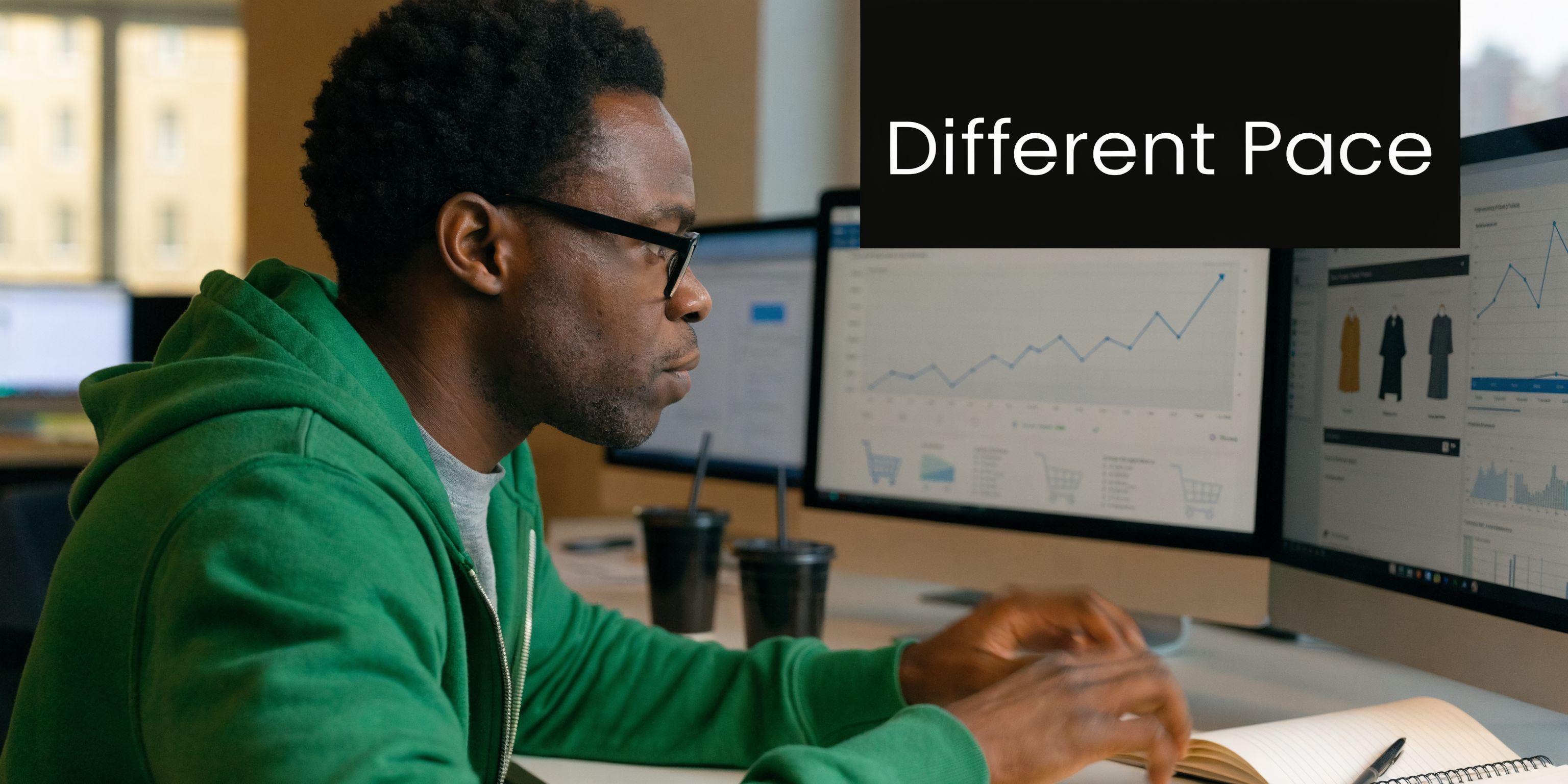 A focused entrepreneur analyzing ecommerce sales data trends on his computer screen in a modern office setting.