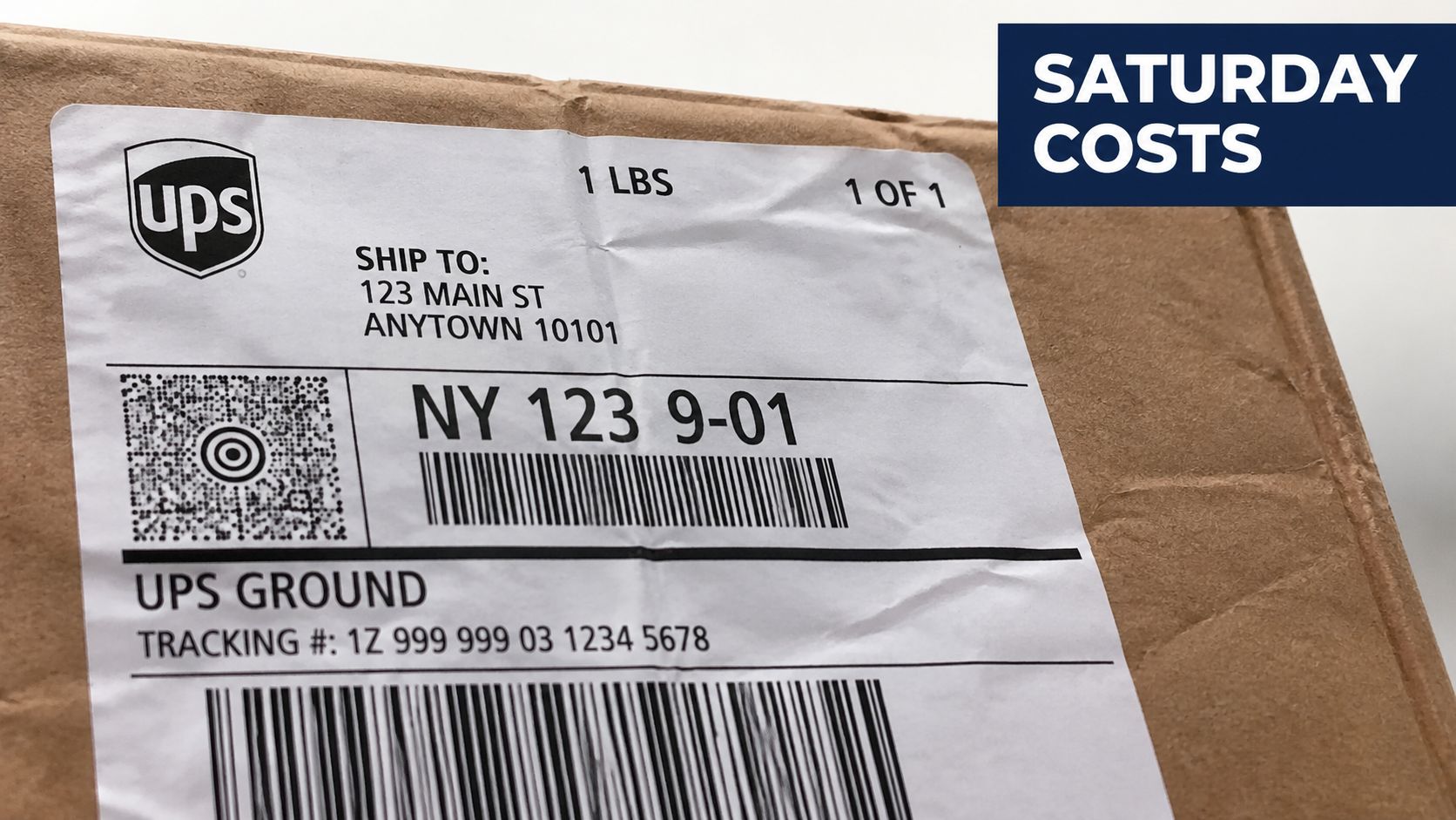 A close-up of a UPS shipping label attached to a cardboard package.