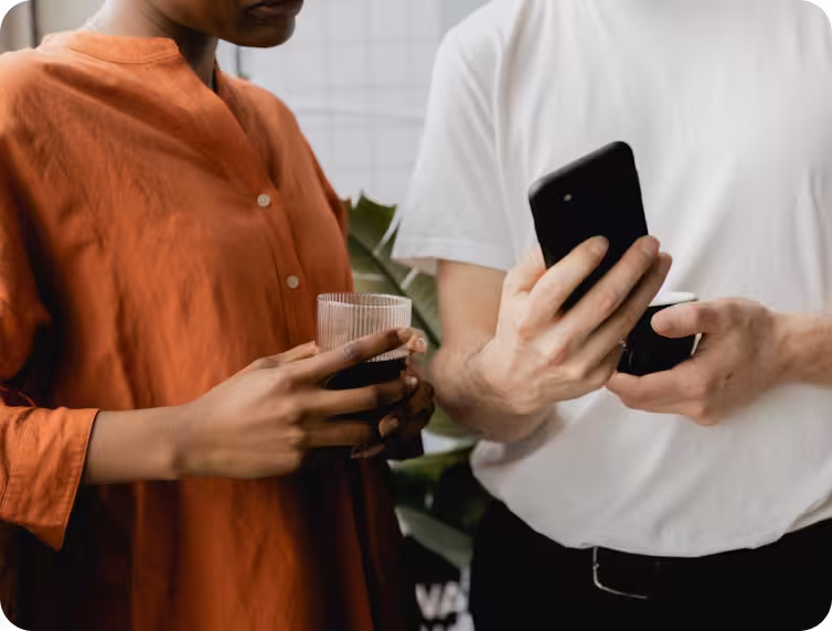 Two people meeting and sharing their professional details using digital business cards