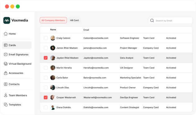 Voxmedia company dashboard showing a list of team members with their names, emails, job titles, card types, and activation status, with two members selected.