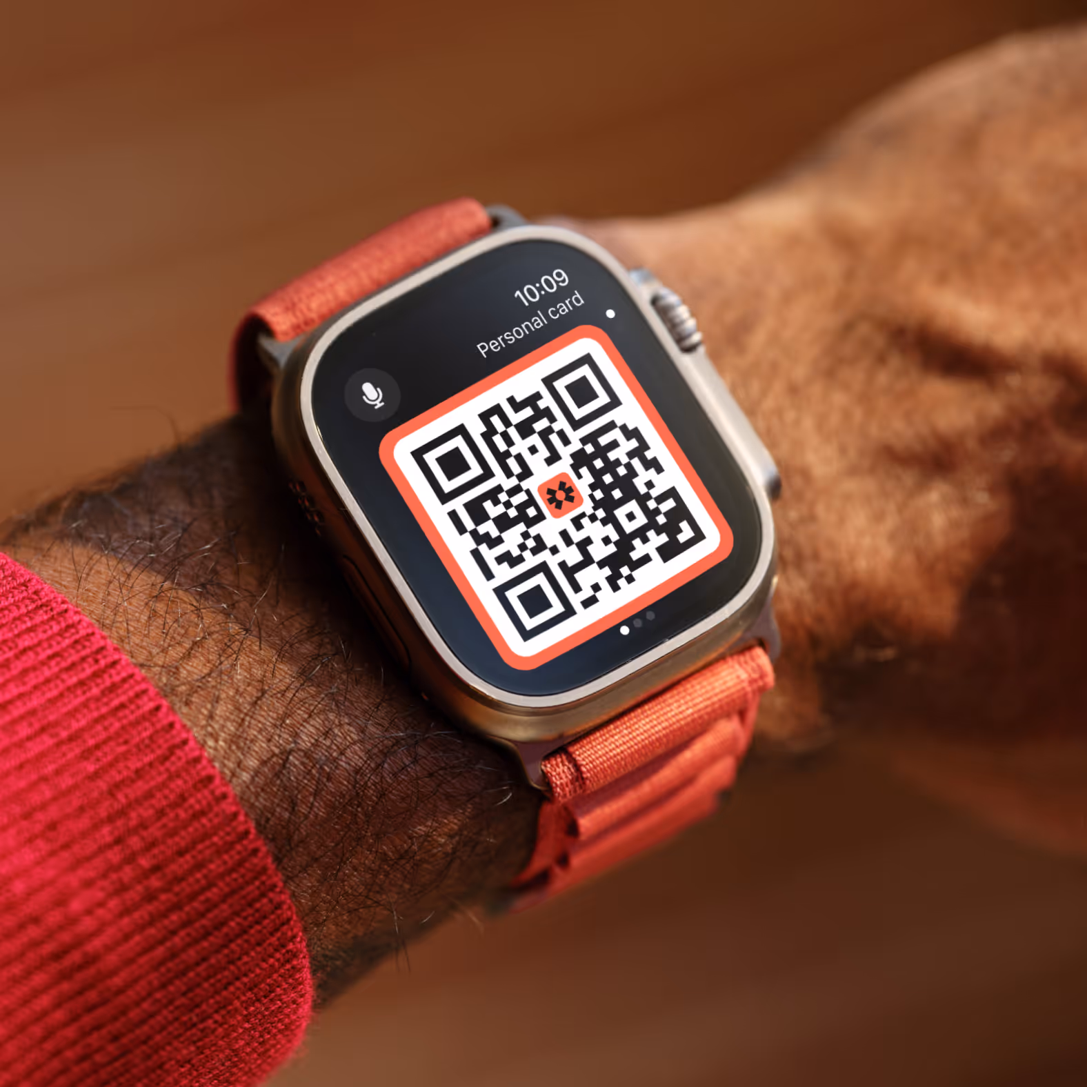 Apple Watch displaying a Blinq digital business card with QR code on its face