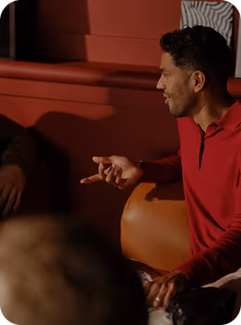 Professional engaging with a potential lead at a networking event.