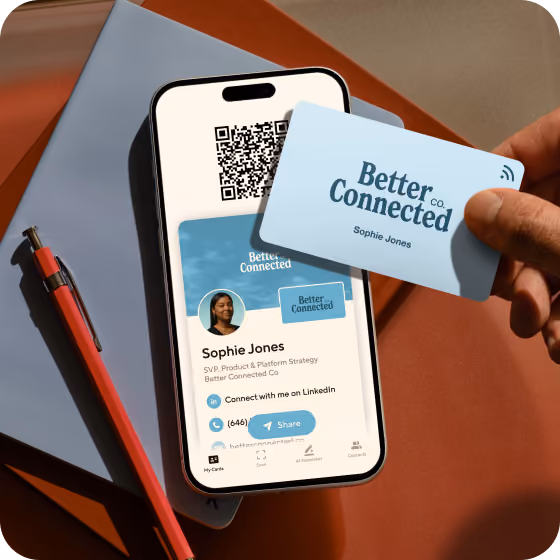 A hand holding a light blue custom NFC card above an iPhone showing the matching Blinq profile and QR code