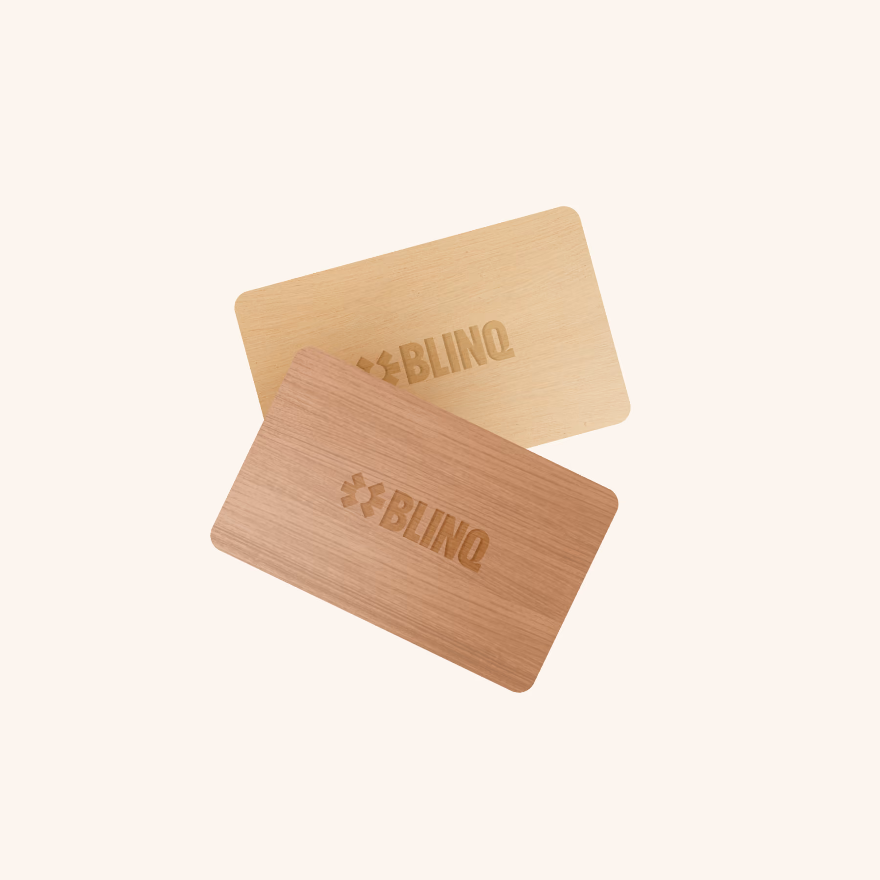 Two Blinq eco NFC business cards in light and dark real wood, with the Blinq logo laser engraved