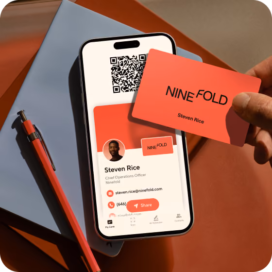 A hand holding a light blue custom NFC card above an iPhone showing the matching Blinq profile and QR code