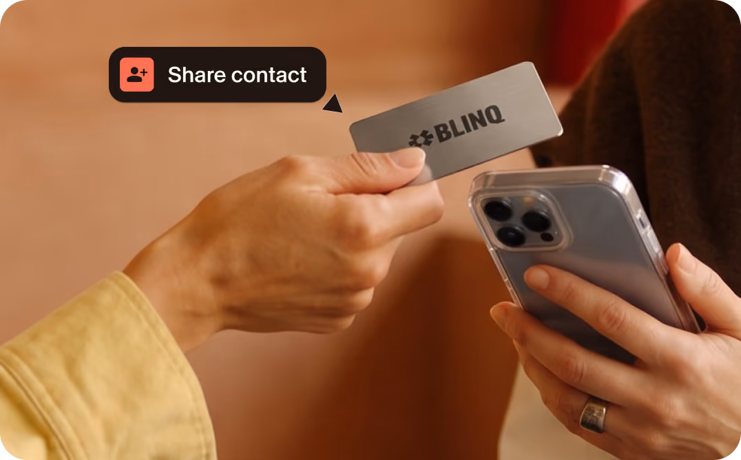 Tapping an NFC card to share contact details