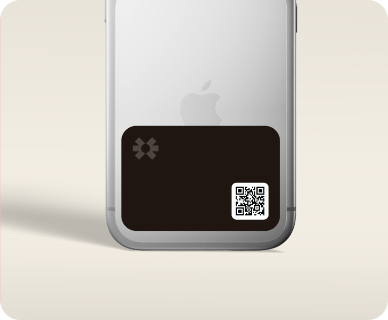 Blinq NFC phone sticker on the back of an iPhone