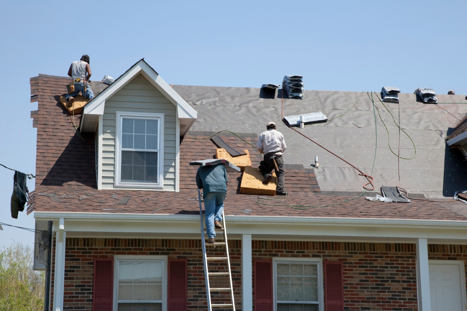 Roofers repairing roof in San Antonio