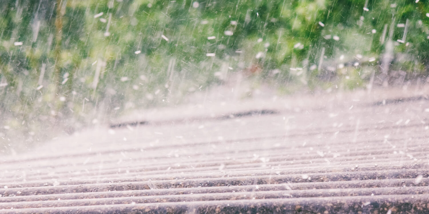 Hail falling on a roof
