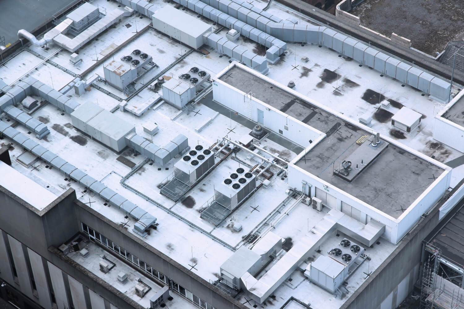 Commercial building rooftop with HVAC systems.