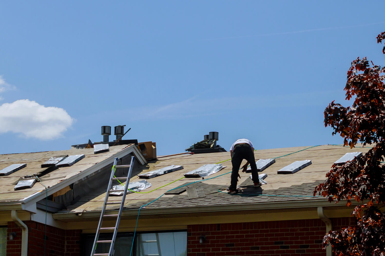 Roofer repairing a San Antonio roof.