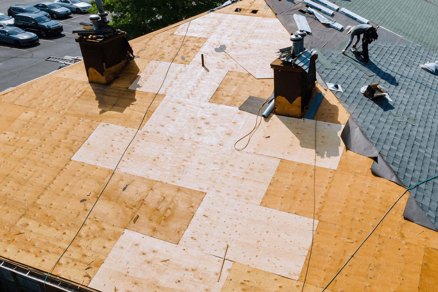 Rooftop in San Antonio mid-repair with new plywood.