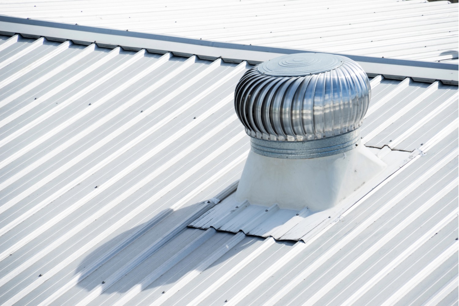 Metal roof with turbine vent
