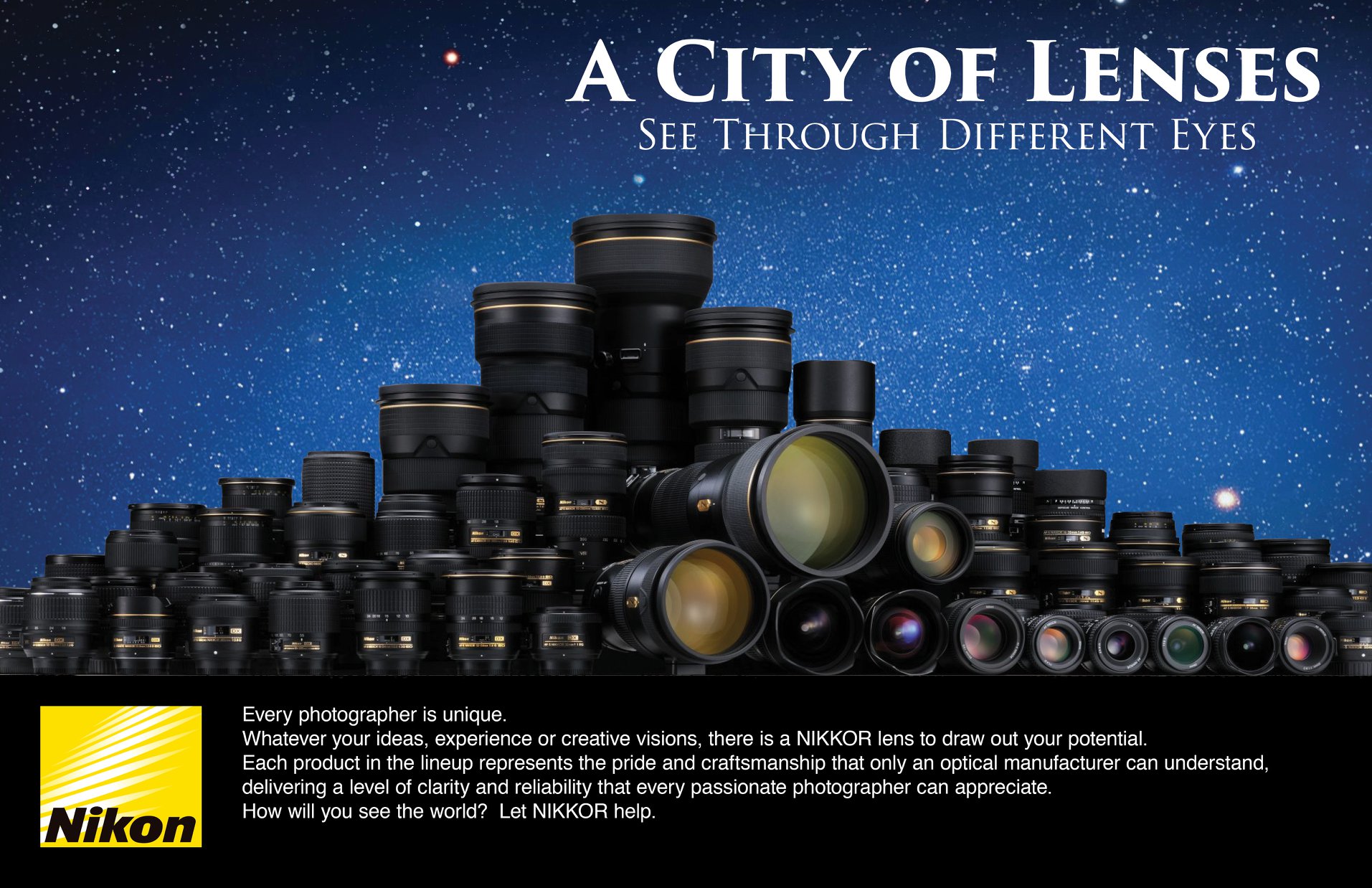 Stacked camera lens casings forming generic city skyline at night.