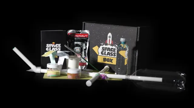 A Space Class box with a bunch of items inside of it.