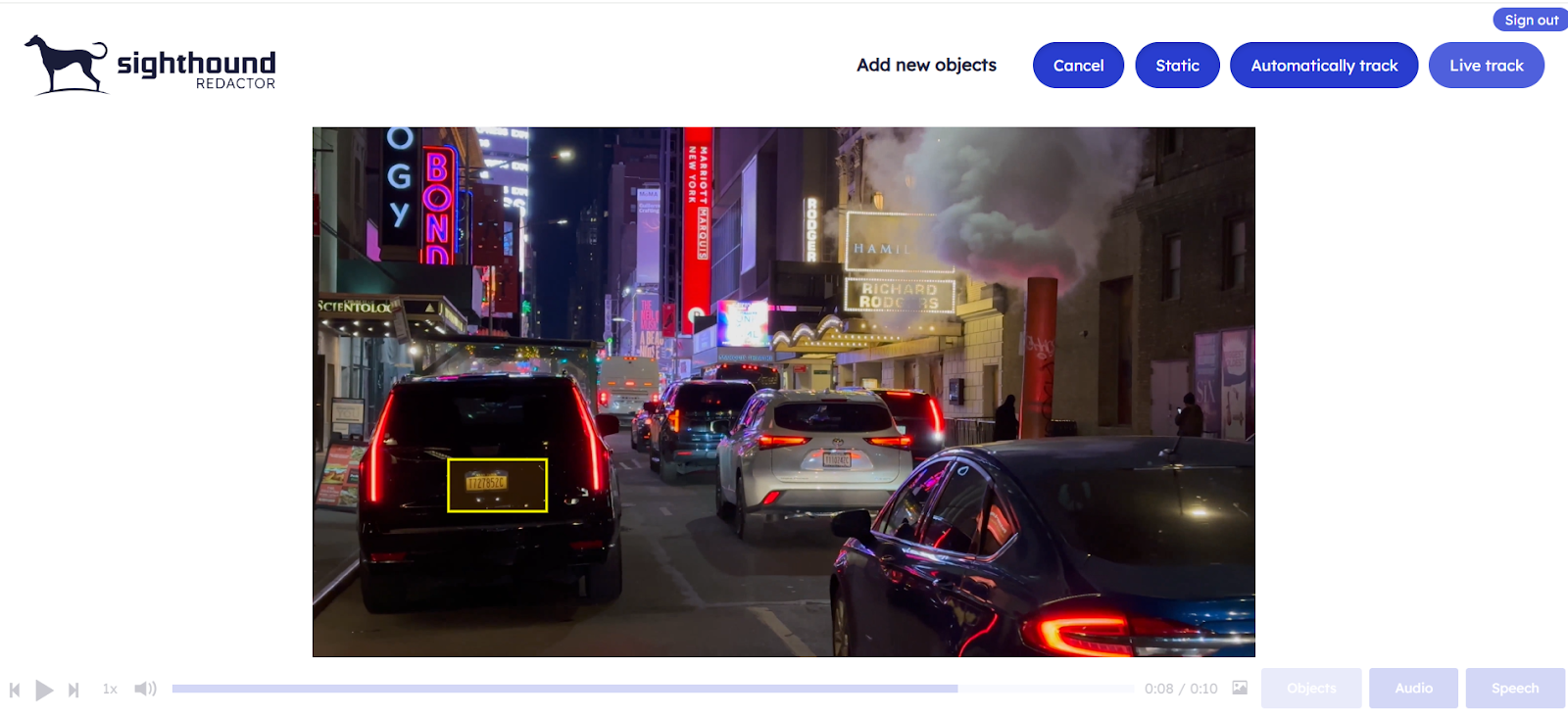 Sighthound Video redaction interface with manual license plate selection highlighted in yellow box, showing tracking mode options (Static, Automatically track, Live track) for privacy protection in an urban night scene