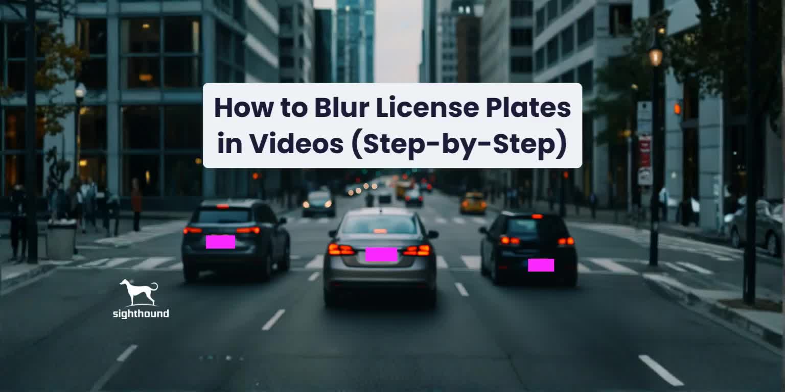 Redacted traffic video frame showing blurred license plates on vehicles driving through a modern city street, illustrating privacy compliance in AI redaction.