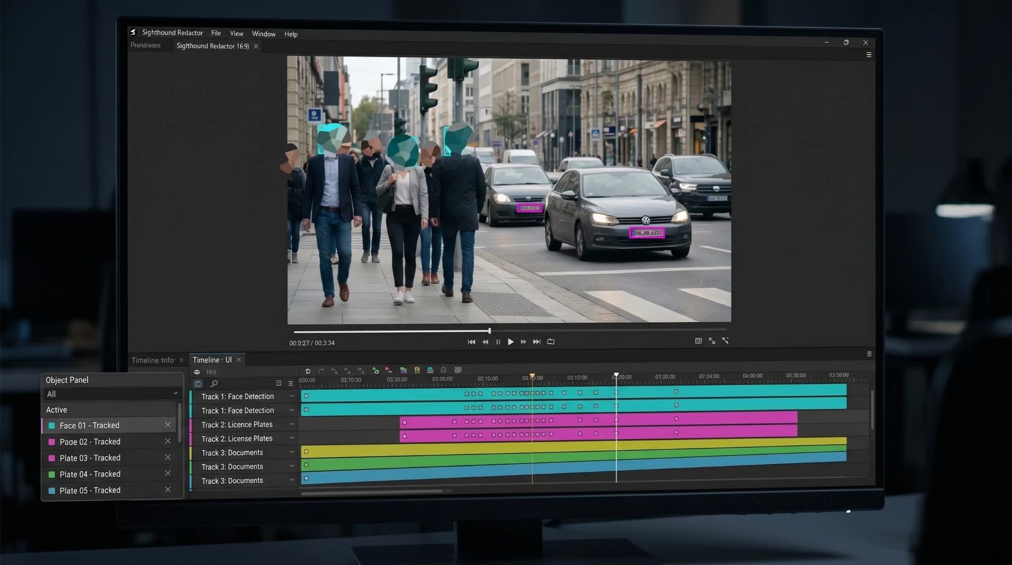 A computer monitor displaying video redaction software, showing a street scene where pedestrian faces and car license plates are actively masked, alongside a multi-track timeline and object tracking panel