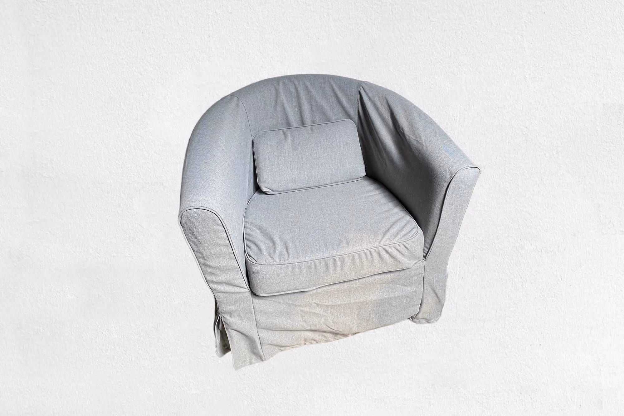 Grey fabric armchair for hire