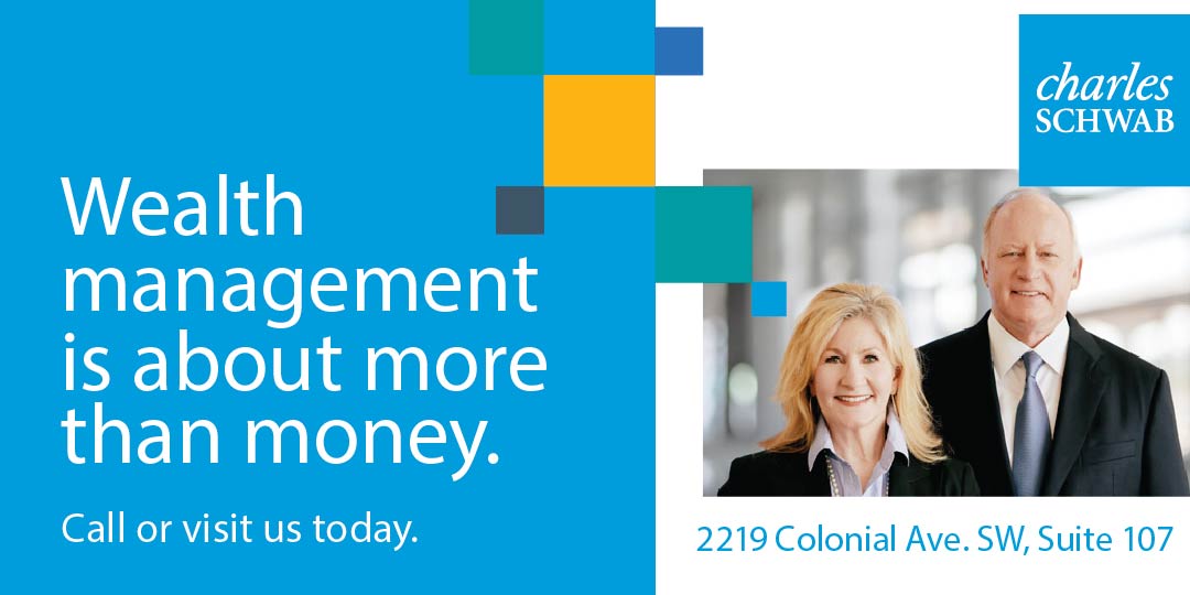 Charles Schwab advertisement with the text 'Wealth management is about more than money. Call or visit us today.' Includes a photo of a smiling professional older woman and man in business attire and the address 2219 Colonial Ave. SW, Suite 107.