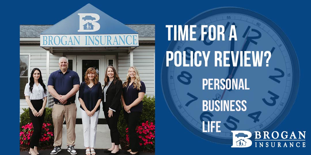Five staff members standing outside Brogan Insurance office under the sign, next to text asking 'Time for a policy review?' and listing Personal, Business, Life insurance options, with a clock background and Brogan Insurance logo.