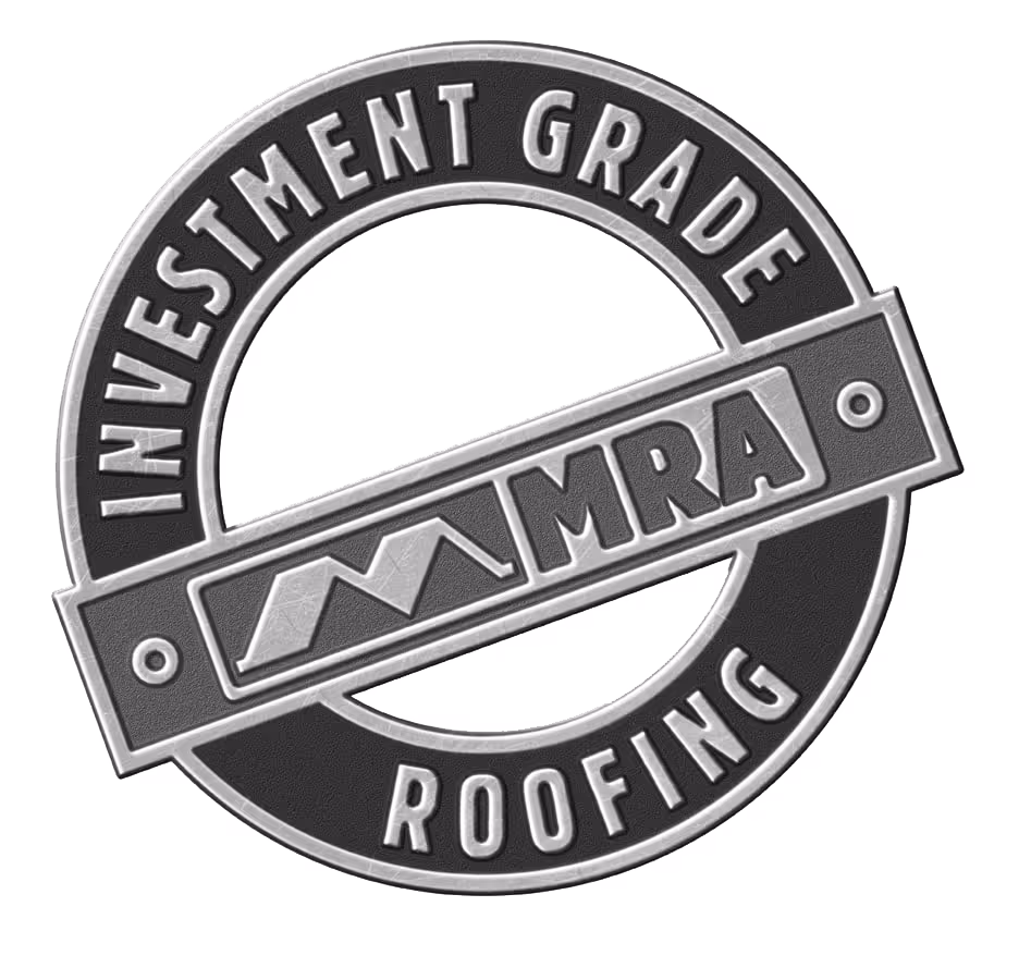 Round emblem with the words 'Investment Grade Roofing' surrounding a diagonal banner displaying 'MRA' with a mountain logo.