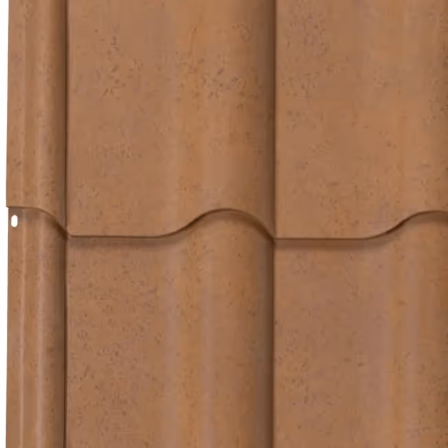 Close-up of terracotta-colored metal barrel roof tiles with a textured finish.