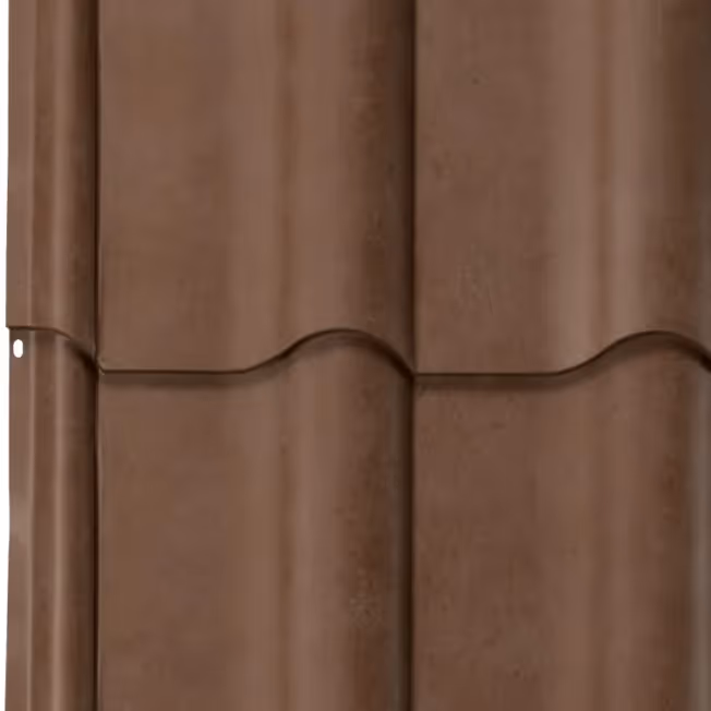 Close-up of auburn metal barrel tile roofing with a textured matte finish.