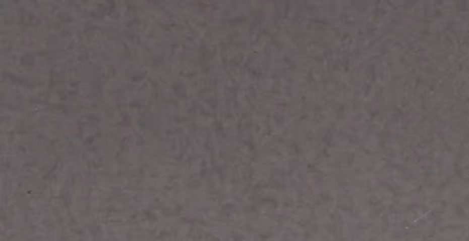 Close-up of a dark gray textured surface with marbled patterns.