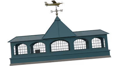 Green metal cupola with arched windows and an airplane weather vane on top.