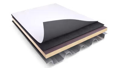 3D illustration of a multi-layered roofing or insulation panel with a white top layer, black middle layers, a beige layer, and a corrugated metal bottom layer.