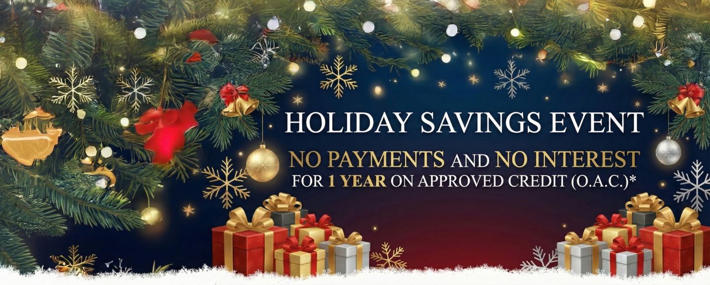 Holiday savings event banner with Christmas tree branches, ornaments, and wrapped gifts with text about no payments and no interest for 1 year on approved credit.