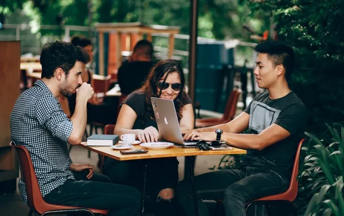 Millennial group has a discussion together. Understanding this generation, and using Kudos helps organizations build stronger workplace culture. 