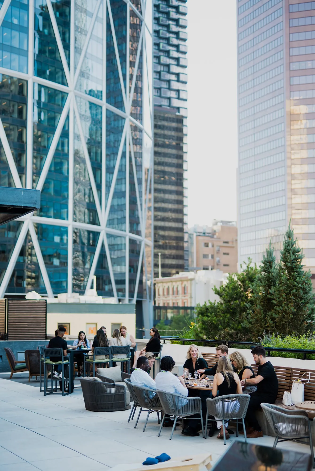 Kudos team socializing on office patio