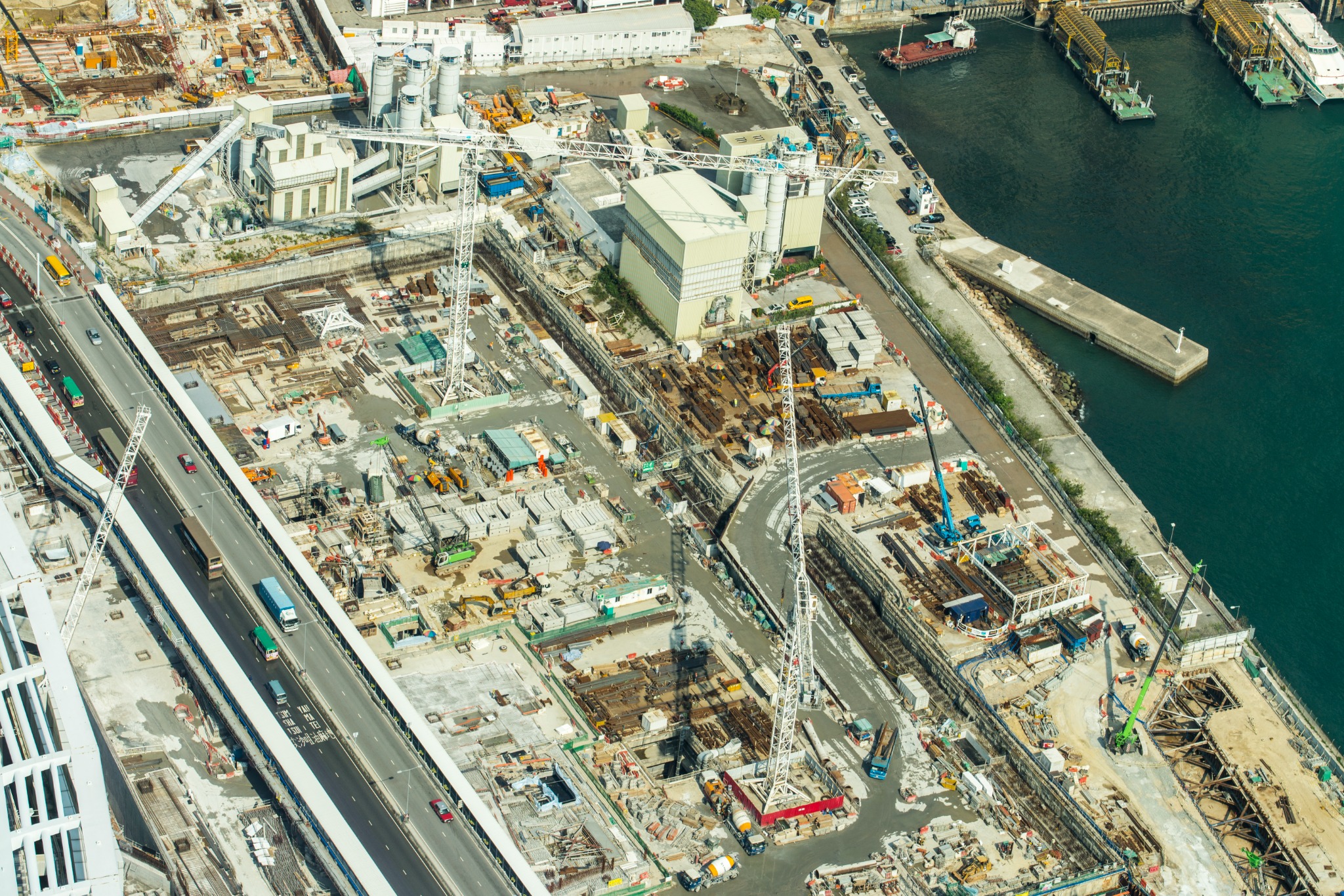 Construction site with cranes by the harbour