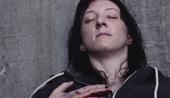 Laura Jane Turner gripping the concrete surface — still from Curve by Tim Egan (2016)