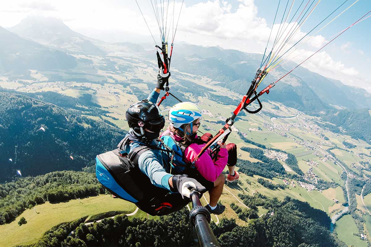 Tandem Gleitschirm fliegen in Kössen