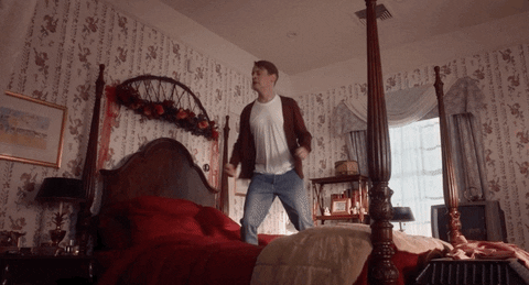 google assistant home alone again nostalgia marketing kevin mcallister jumping on bed gif ecommerce referralcandy