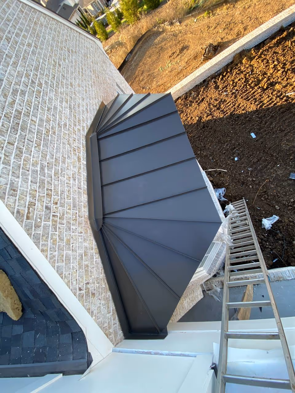 Angled Gray Standing Seam Dormer