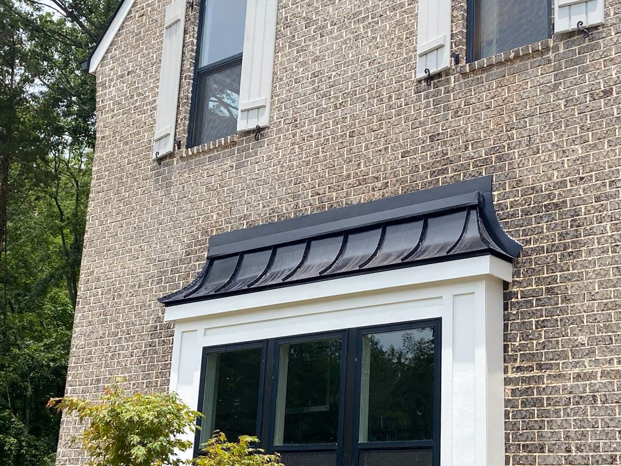Curved Black Standing Seam Dormer