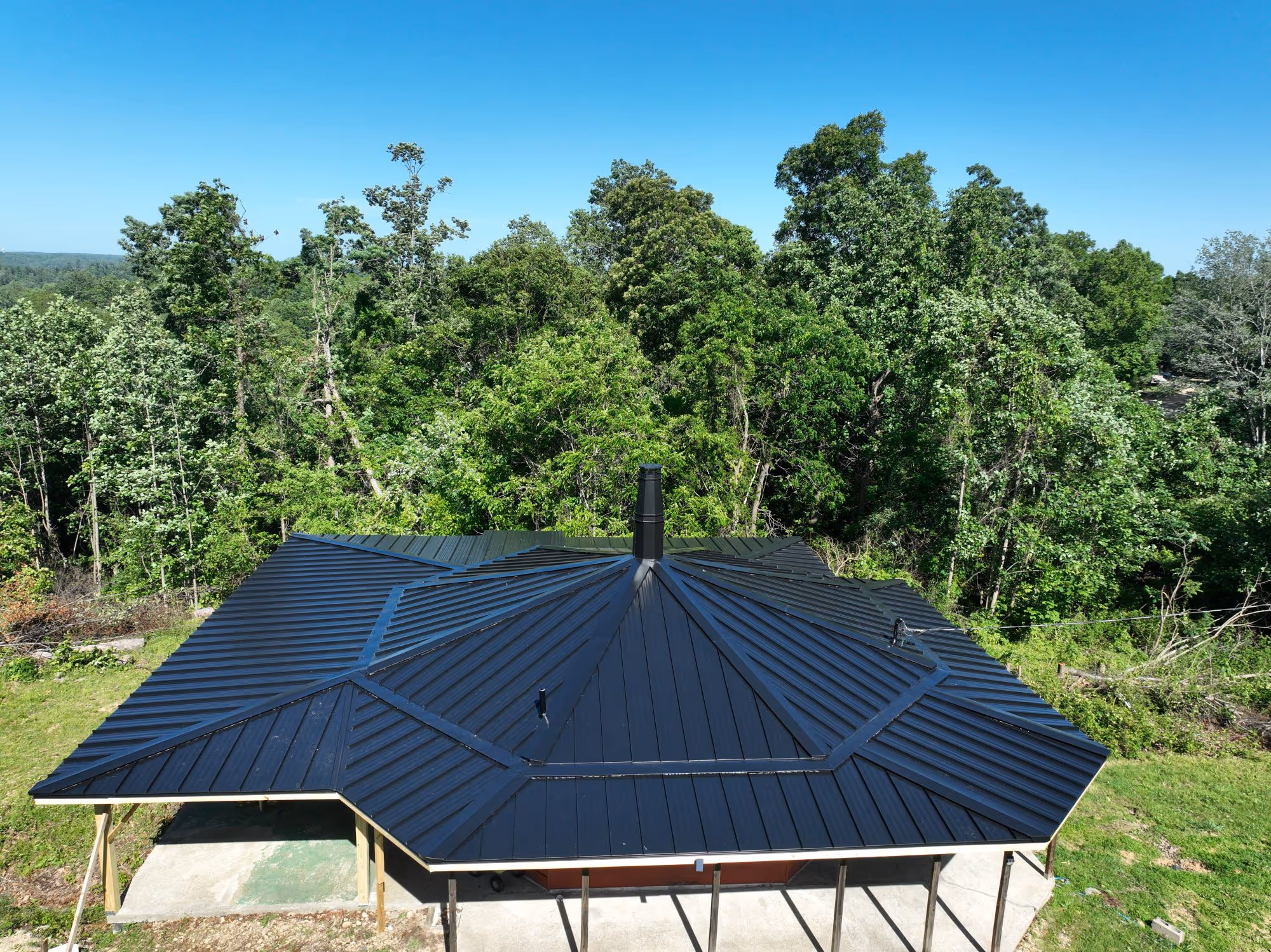 Black Standing Seam Low Profile Home