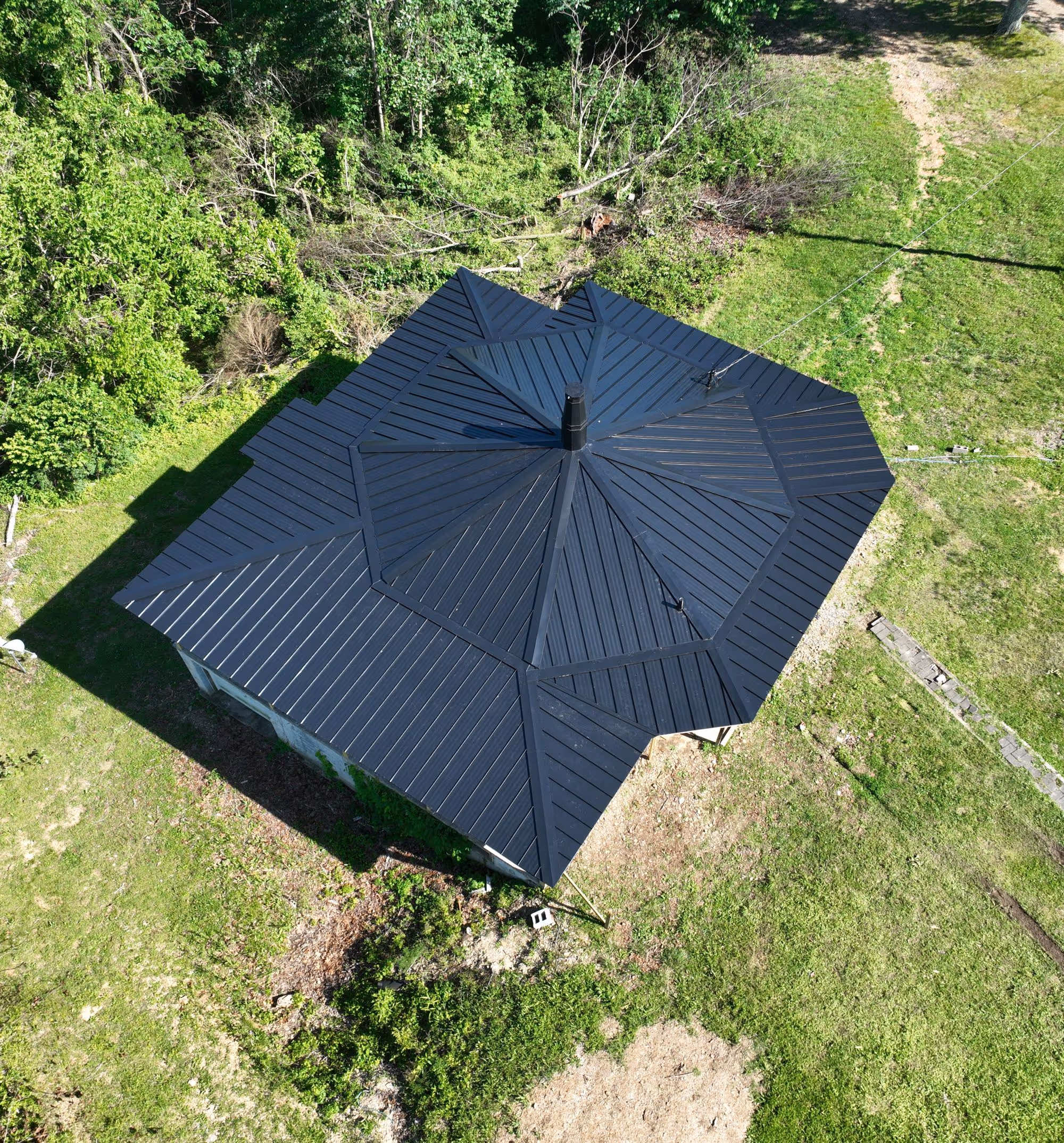 Black Standing Seam Low Profile Home