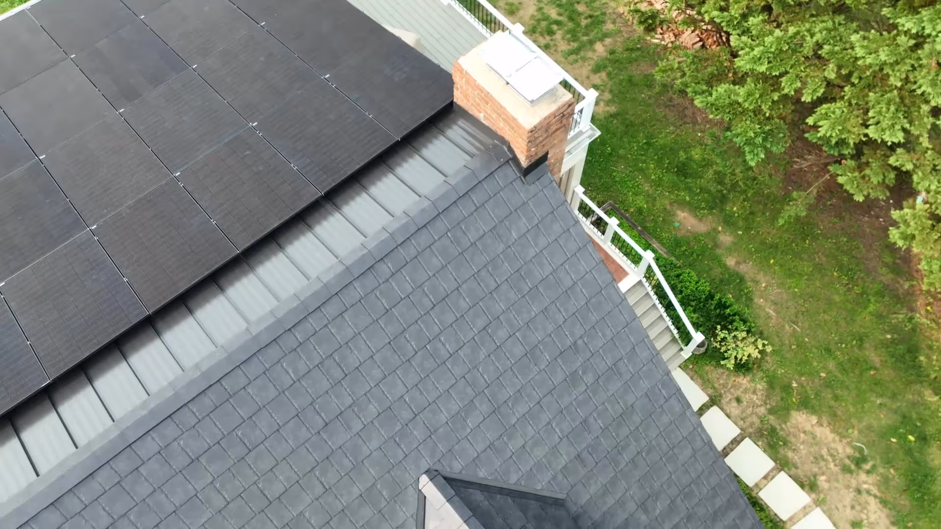 Black Steel Shingles with Standing Seam and Solar Zoomed Out