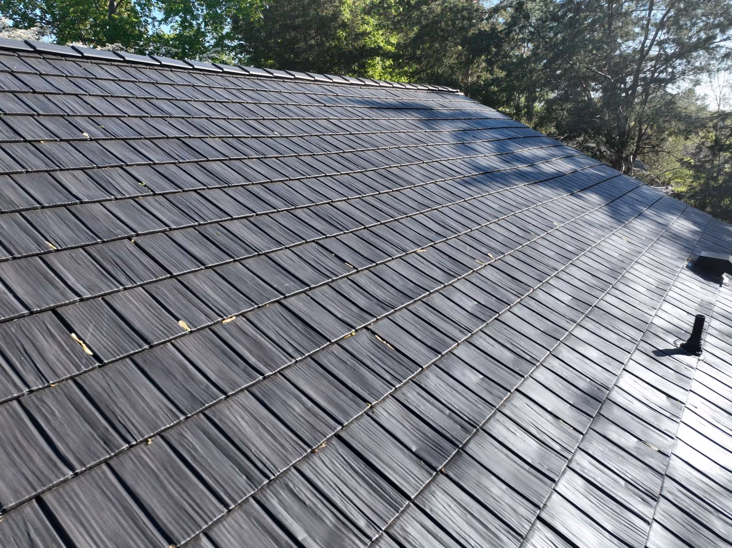 Blue House Grey Roof Backyard