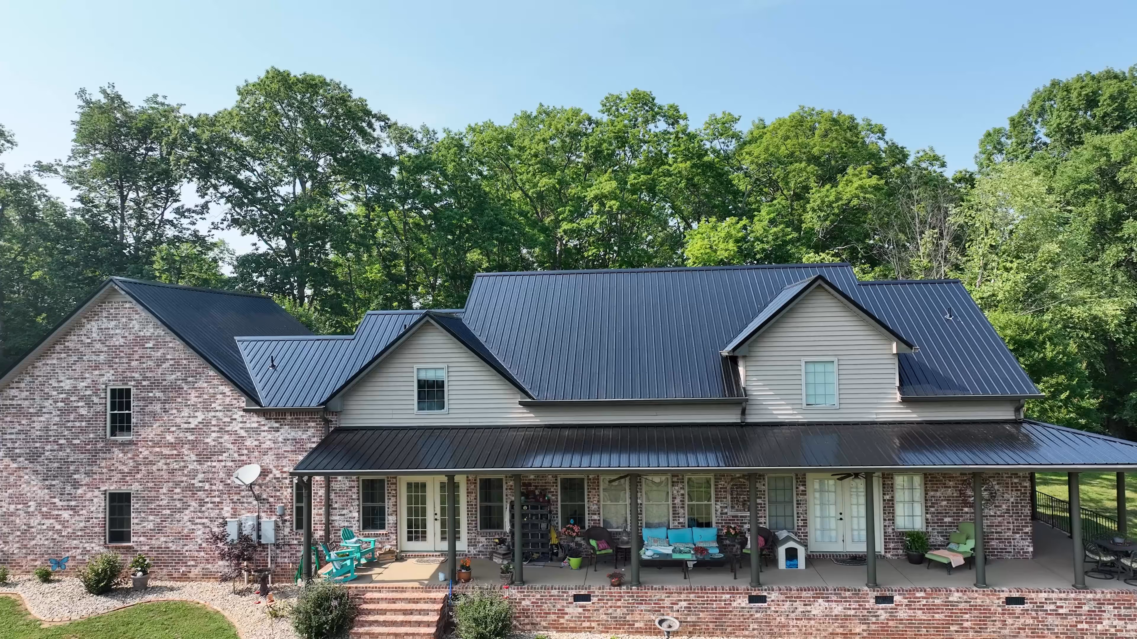 Black Standing Seam Country Home On A Pasture Hill